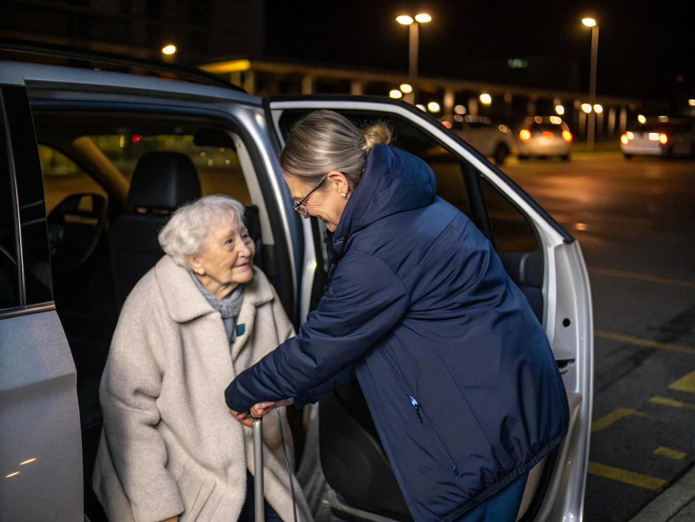 Compassionate specialist escorting an elderly patient toward the burgundy Dodge Durango for a routine doctor's visit